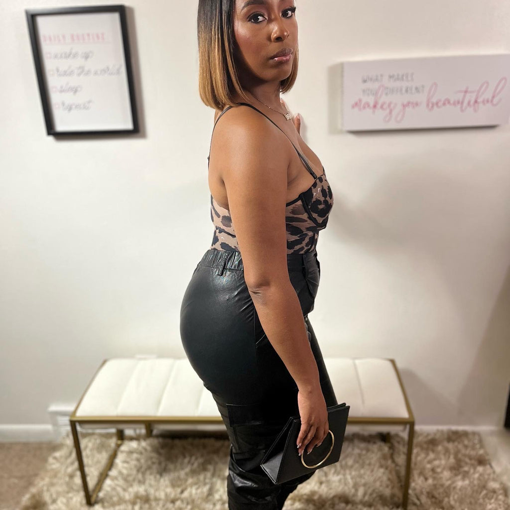 A beautiful faux leather stunning and sleek black dress/type or casual pant, fit snug for any body type with slight flare on the bottom for professional looks.