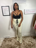 Beautiful pants that are flared sweatpants track-suit colored, slightly yellow/beige color, drawstrings and side stripes, and an elastic waistband with drawstring, .